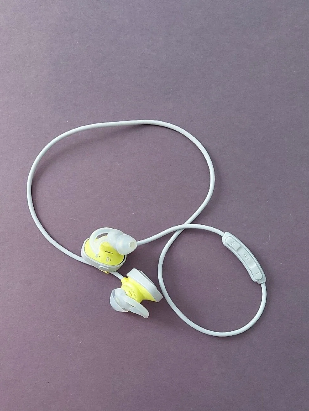 Bose Light Gray Round Earbud Case with Yellow Logo